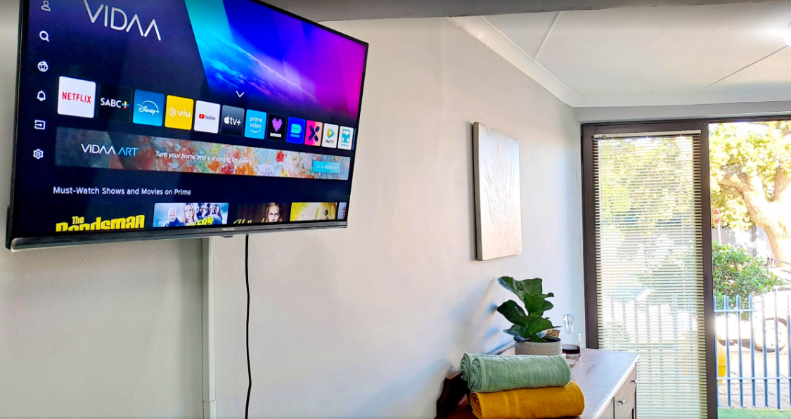 Wall-mounted Smart TV in the lounge